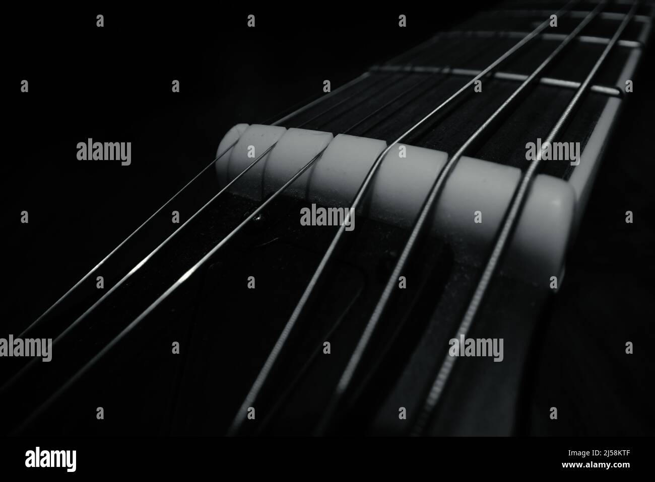 Sixstring electric guitar bone nut Stock Photo Alamy