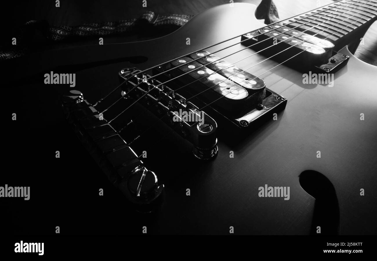 Sixstring electric guitar bridge and saddle Stock Photo Alamy