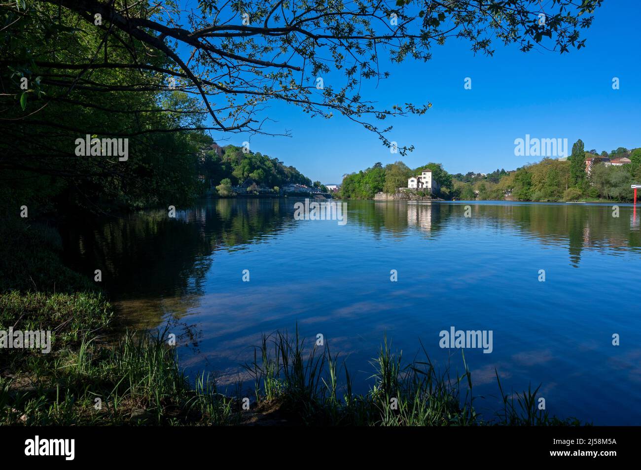 Spring landscape on the banks of the Saône river around Ile Barbe in the Rhône department Stock Photo