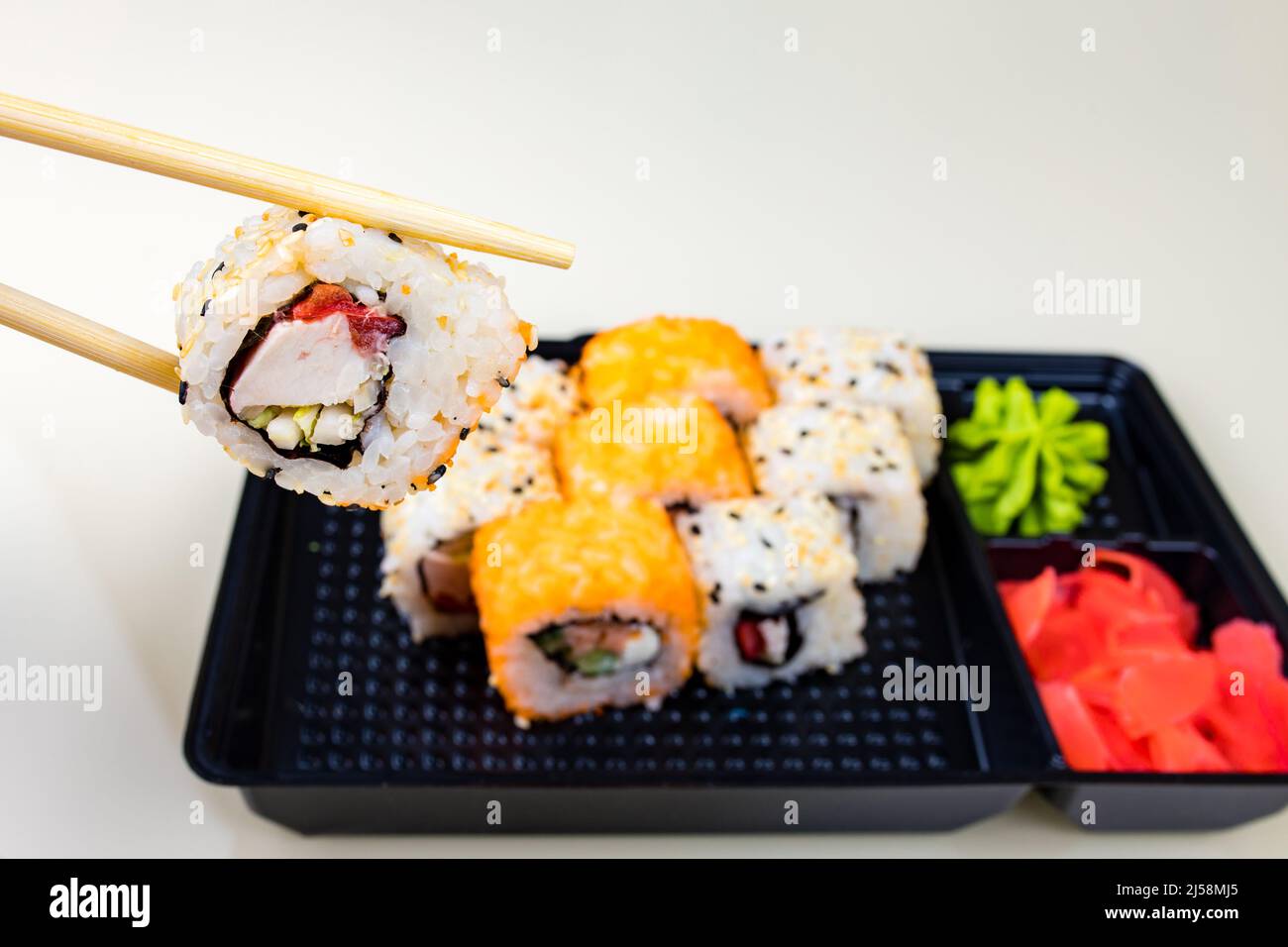 popular asian rolls lunch order to home online Stock Photo