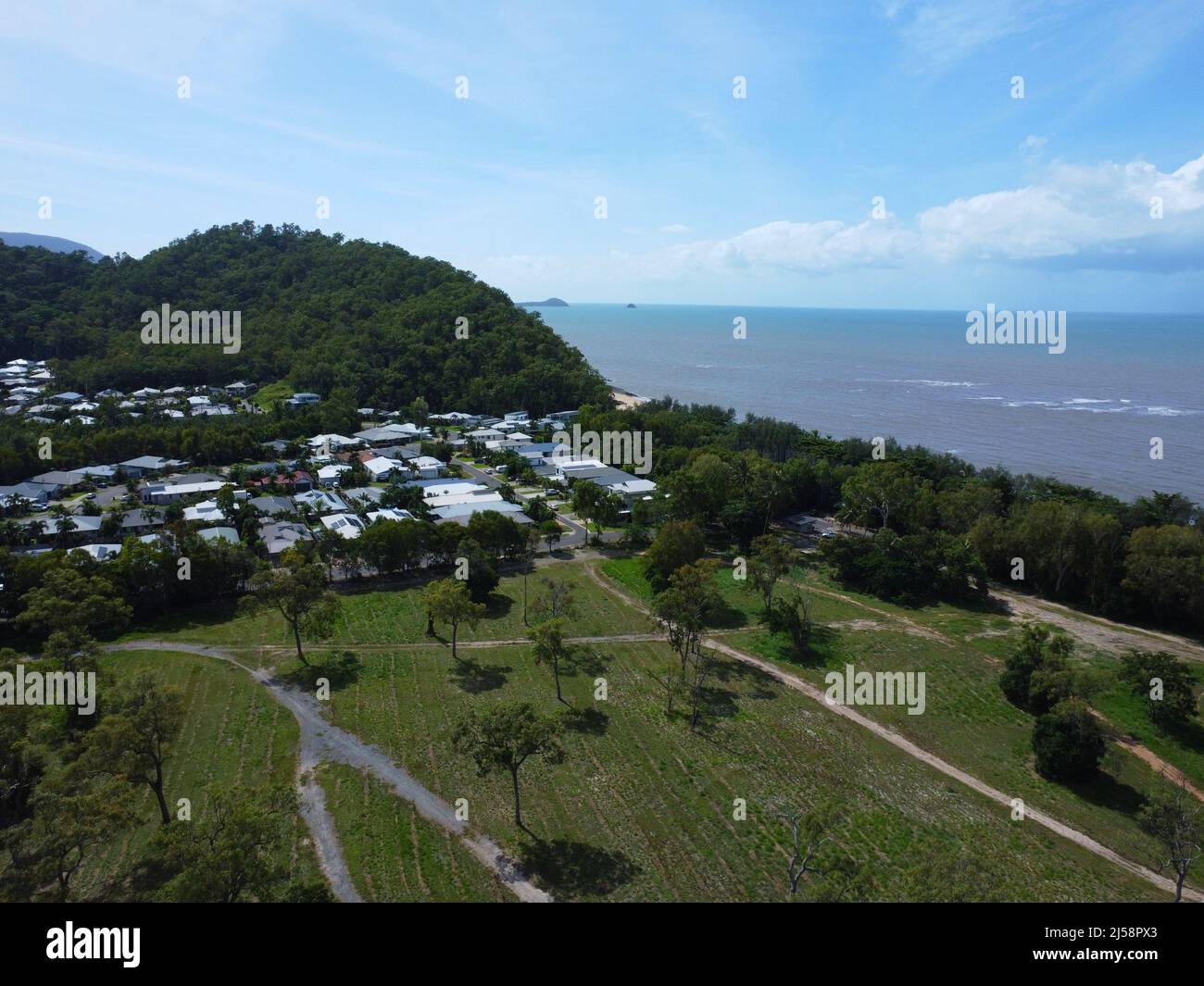 Aerial view of tropical housing estate on the ocean Stock Photo
