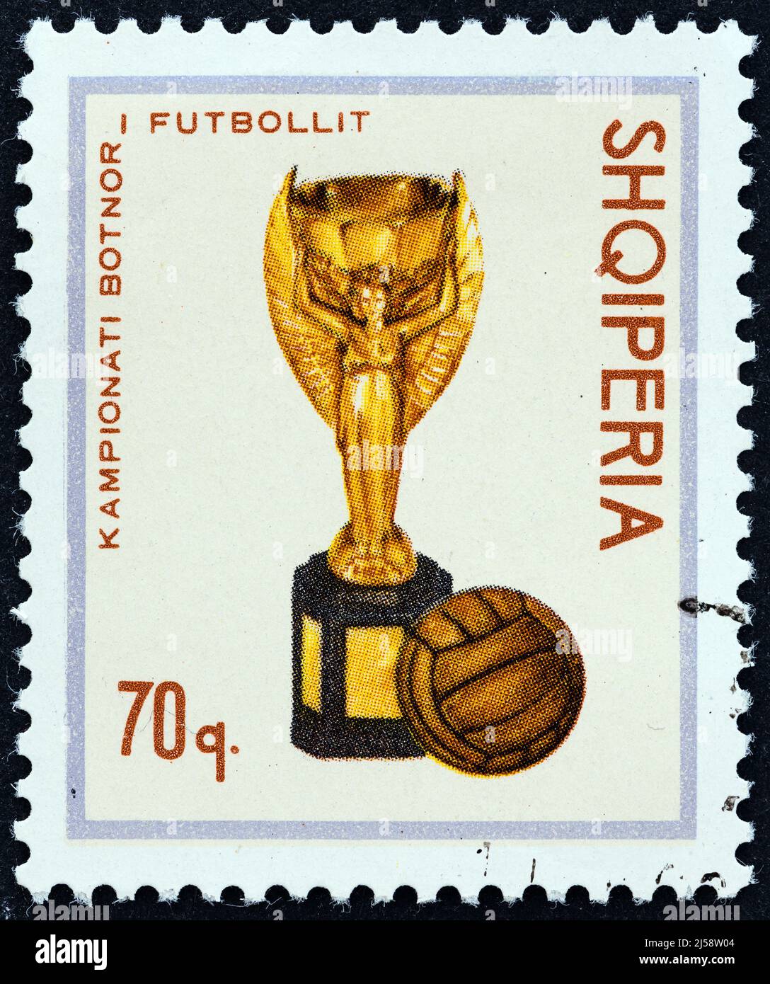 ALBANIA - CIRCA 1966: A stamp printed in Albania from the 'Football World Cup - England' issue shows Jules Rimet Cup and Football, circa 1966. Stock Photo