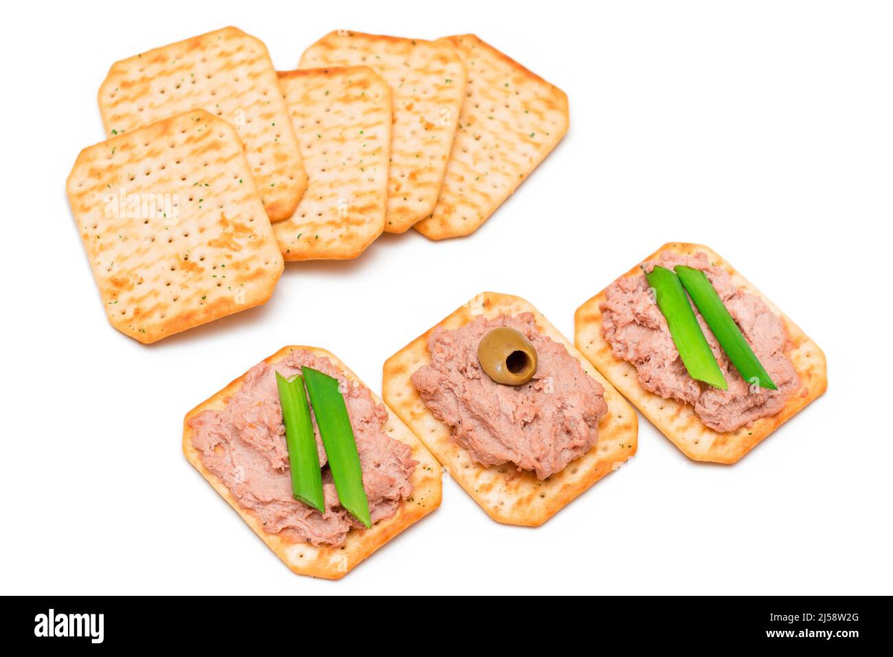 Crispy Salted Crackers with Liver Pate, Green Onions and Olives on