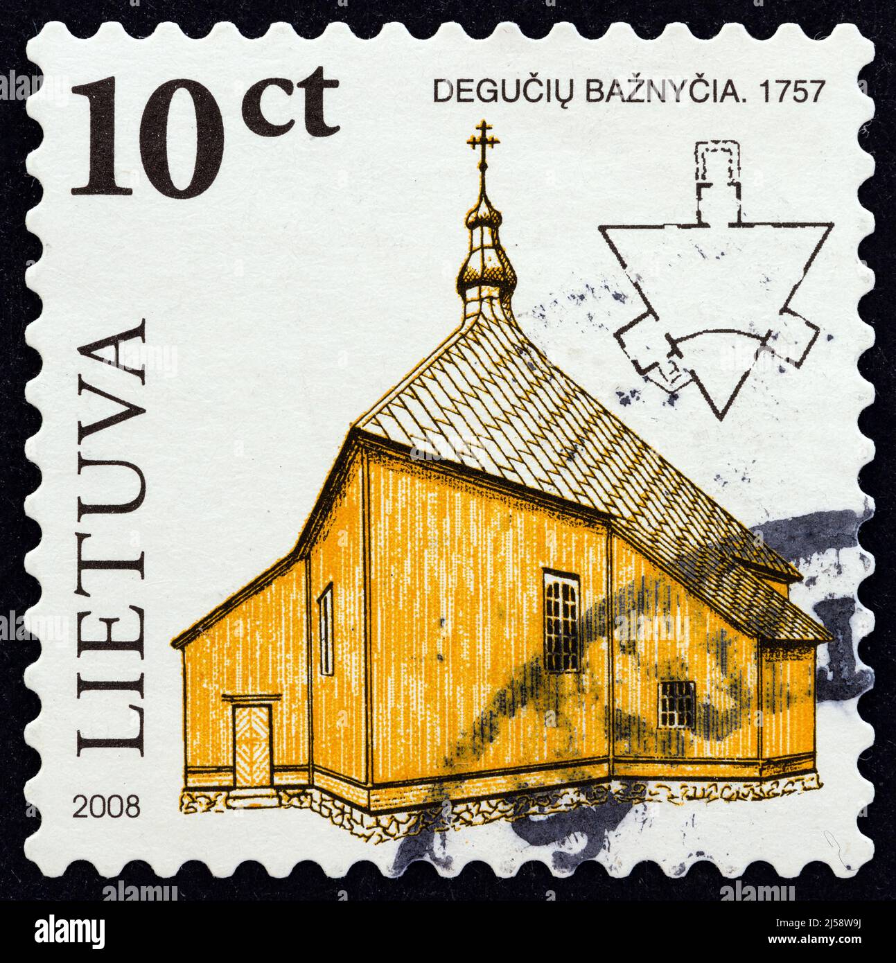 LITHUANIA - CIRCA 2008: A stamp printed in Lithuania from the "Wooden Sacral Architecture in Lithuania" issue shows the church of Deguchiai, 1757. Stock Photo