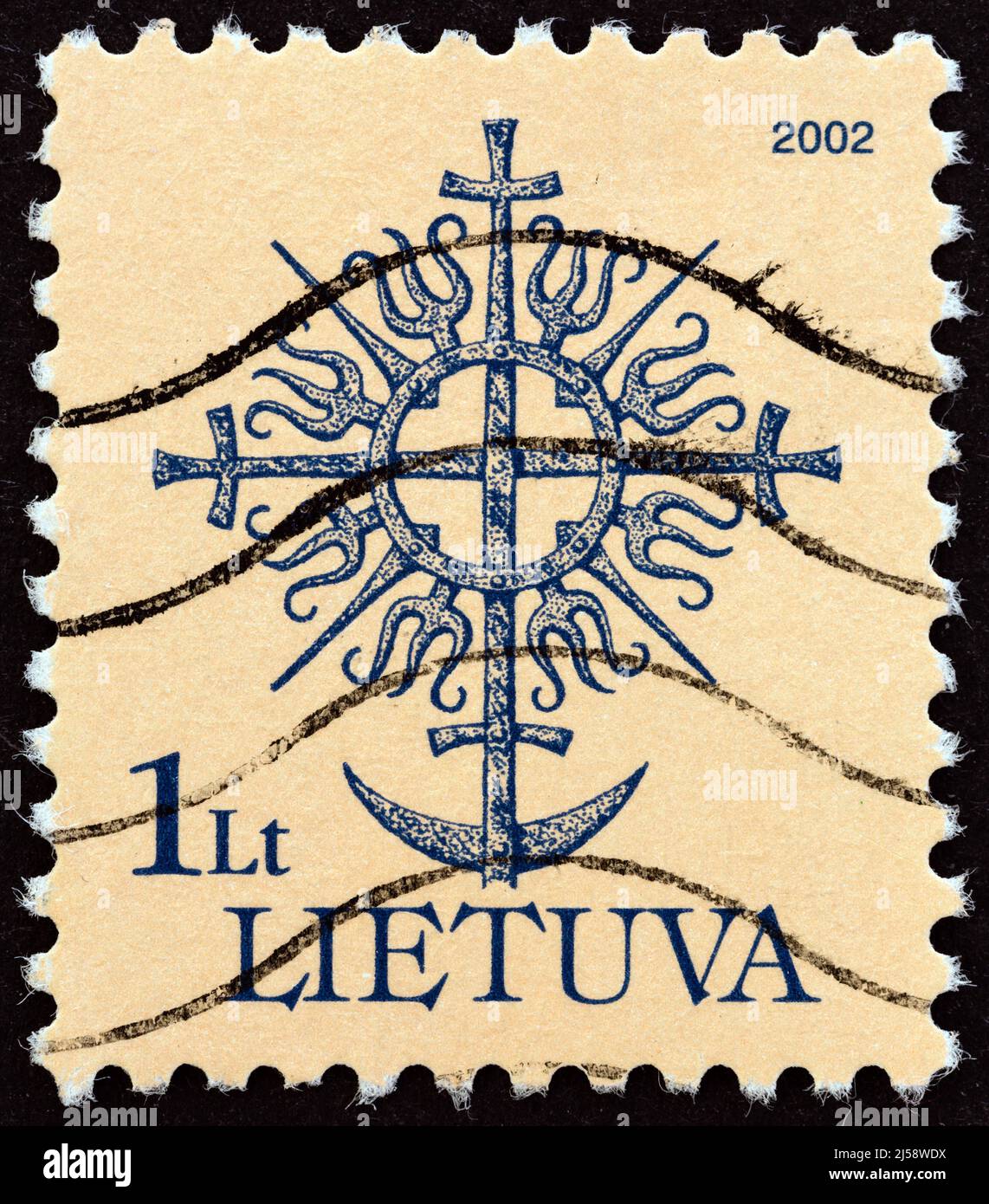 LITHUANIA - CIRCA 2002: A stamp printed in Lithuania shows top of the monument in Veiviryunay, circa 2002. Stock Photo
