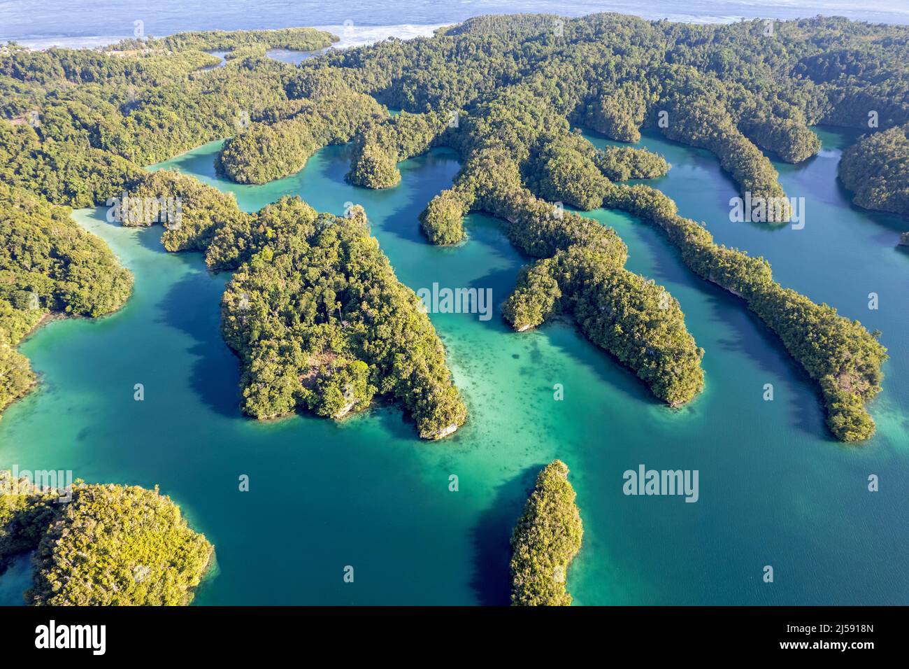 Aerial view of Gam Island calcium carbonate coastal structures, Raja Ampat Indonesia. Stock Photo