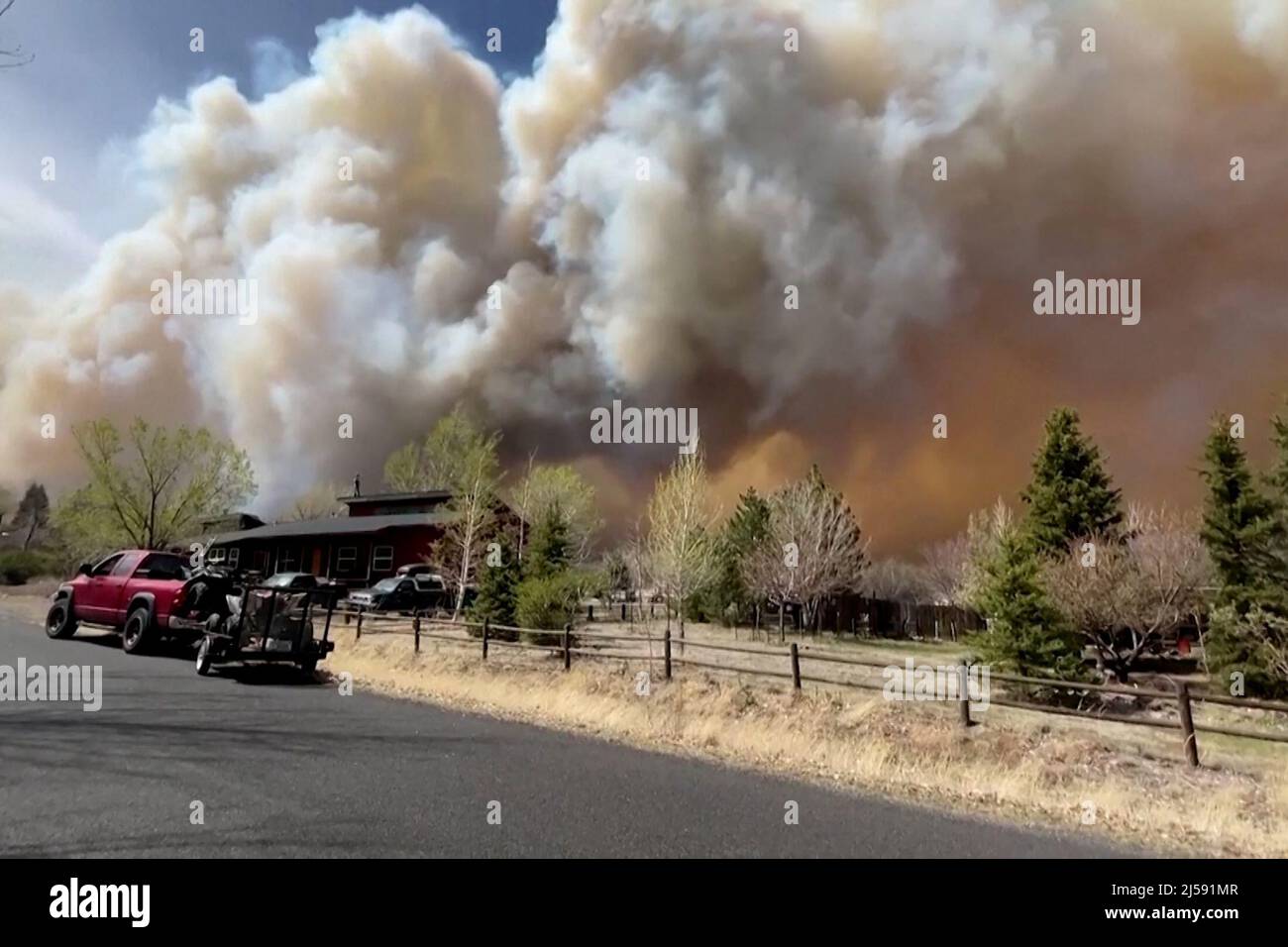 Smoke drifts from the Tunnel Fire north of Flagstaff, Arizona April 19, 2022 in a still image from video. Image taken April 19, 2022.  REUTERS/Reuters TV Stock Photo