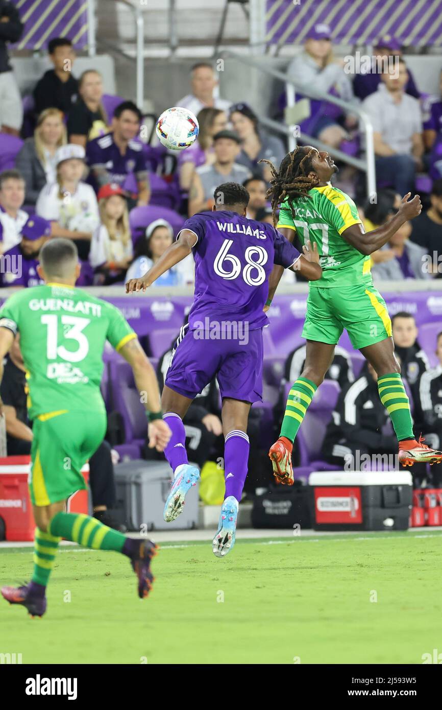 Orlando, FL O69 and Tampa Bay Rowdies forward Lucky Mkosana (77) go up