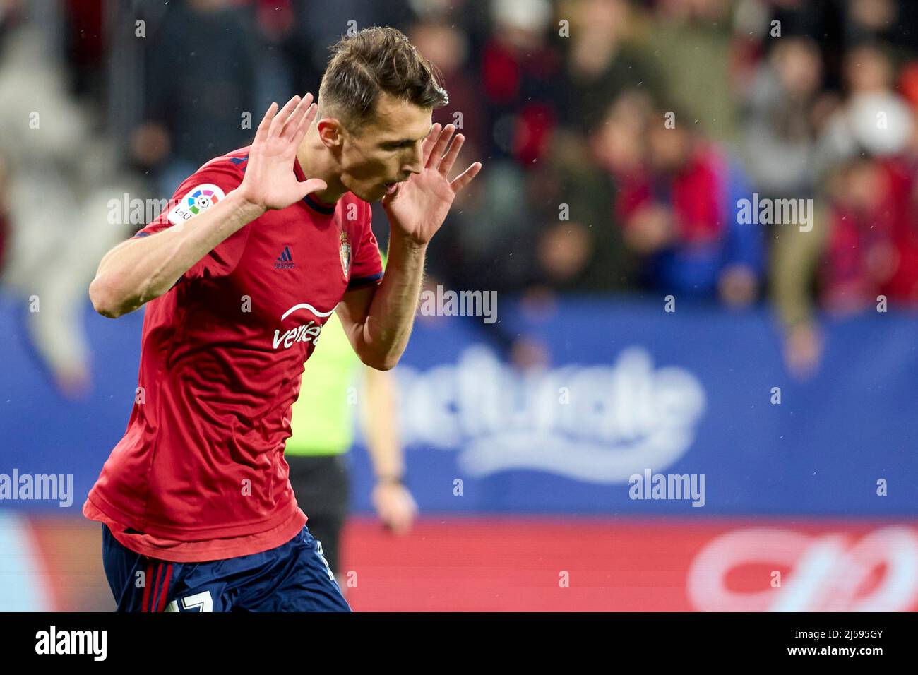 Pamplona, Spain. 11th May, 2021. The referee gives a yellow card to Budimir  during the Spanish La Liga Santander match between CA Osasuna and Cádiz CF  at the Sadar stadium.(Finale Score; CA