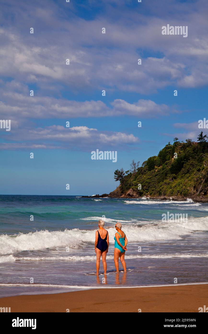Two women at Hot Water Beach on the east coast of the Coromandel