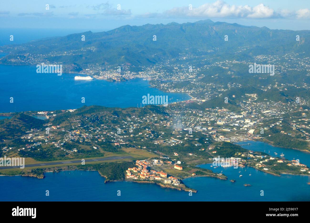 Aerial view of Caribbean Island of Grenada with capital St Georges, sea, and mountainous interior Stock Photo