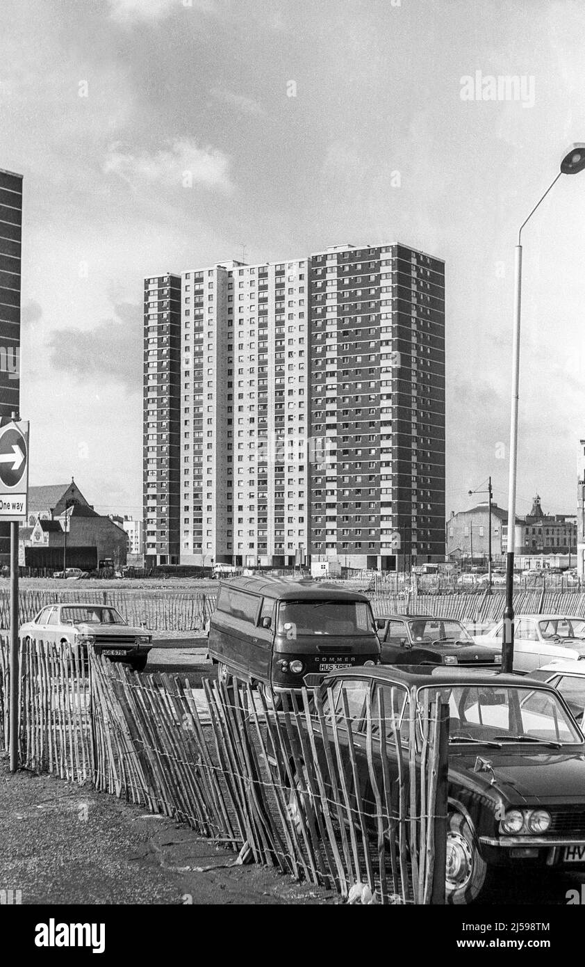 Norfolk Court in the Lauriston Gorbals area of Glasgow was completed in 1973 as part of the new development in the Gorbals Comprehensive Development Area.  The intention was to demolish the slum tenements and replace them with modern high-density housing estates made up of high and low rise flats.  Norfolk Court was demolished in its turn on 8 May 2016 to allow redevelopment of the area.  Image is scan of original b&w negative taken in March 1977. Stock Photo