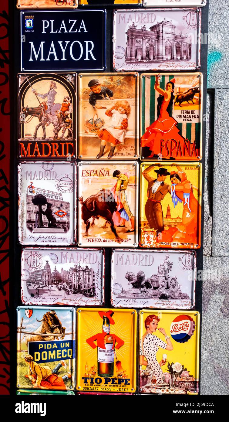 Plaza mayor colorful colourful souvenor plates sold in Madrid, Spain Stock Photo