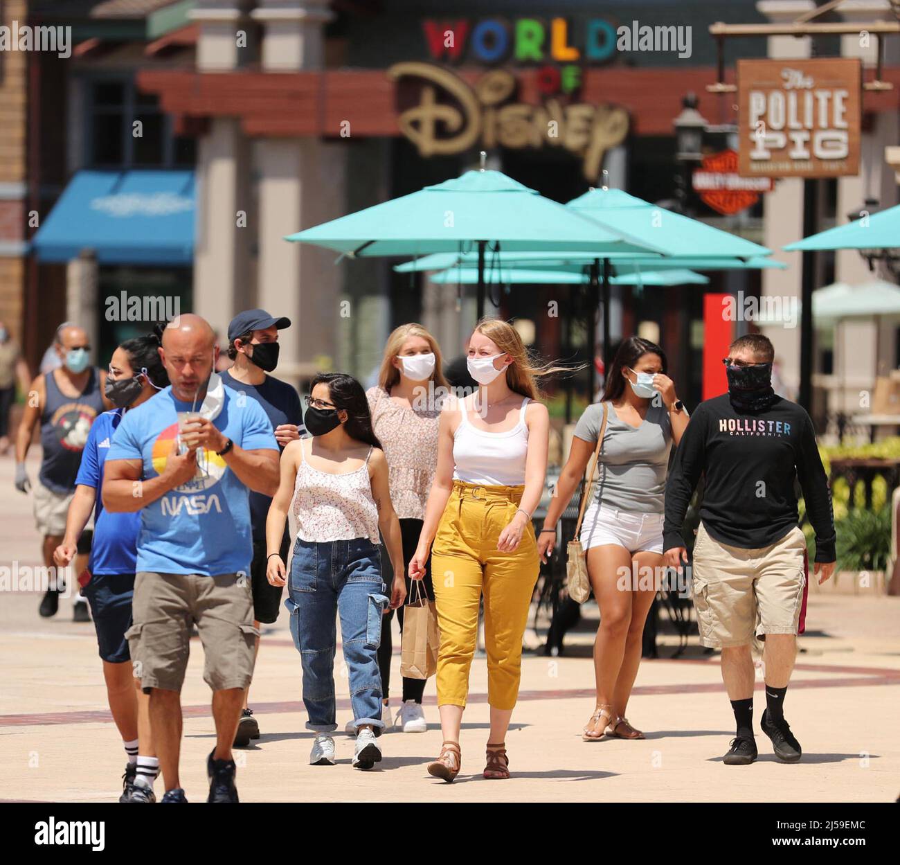 Orlando, USA. 20th May, 2020. Guests stroll at Disney Springs in Orlando on Wednesday, May 20, 2020. Walt Disney World's sprawling shopping and dining complex is beginning the first phase of getting back to business, with 44 establishments welcoming the public during the coronavirus pandemic. (Photo by Stephen M. Dowell/Orlando Sentinel/TNS/Sipa USA) Credit: Sipa USA/Alamy Live News Stock Photo