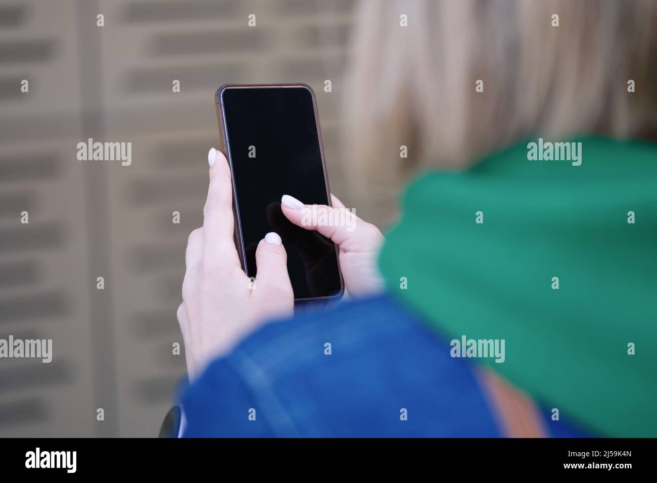 Woman typing text message using mobile phone closeup Stock Photo - Alamy