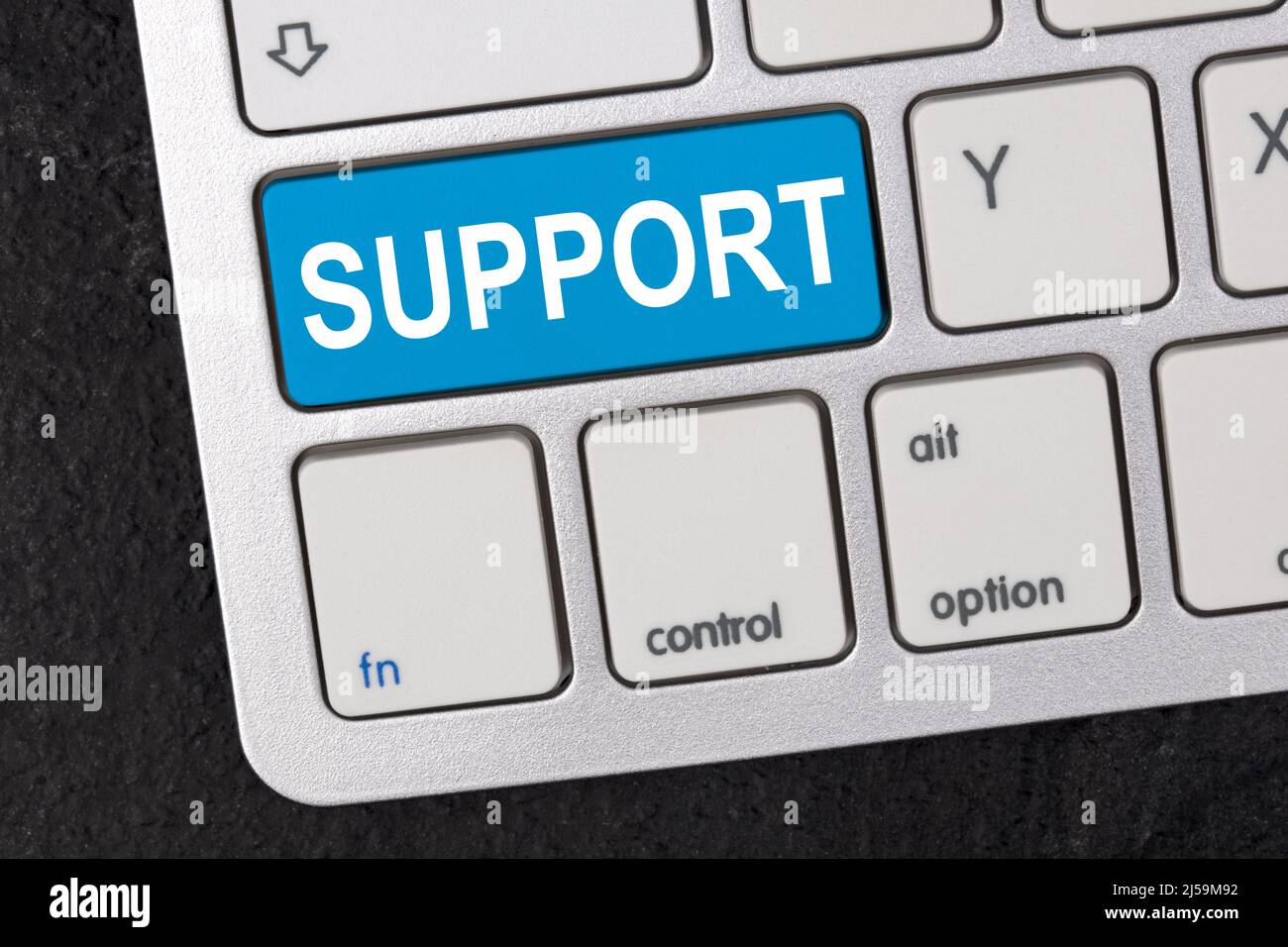 Support on a keypad conceptual for support service Stock Photo