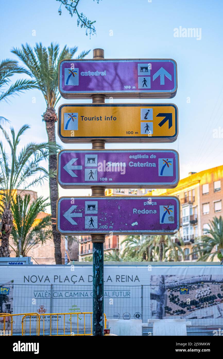 Tourist information signs in purple and yellow colors. Stock Photo