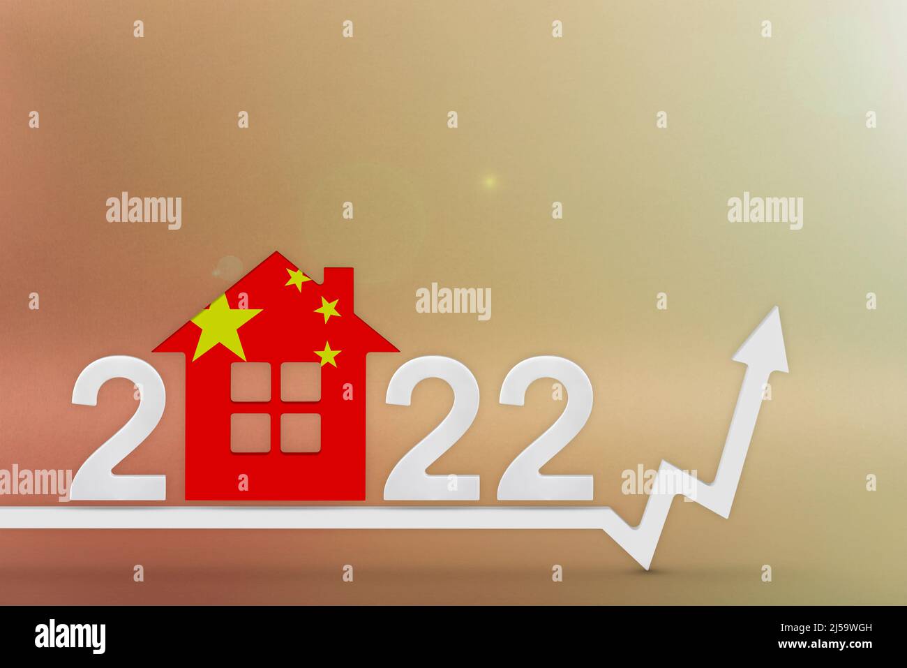 The cost of real estate in China in 2022. Rising cost of construction, insurance, rent in China. House model painted in the colors of the flag, up arr Stock Photo