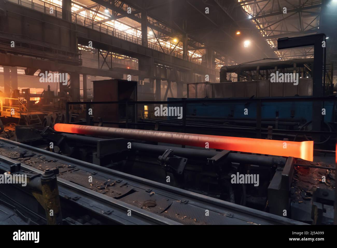 Still hot cast iron water pipe cast and released from molding machine