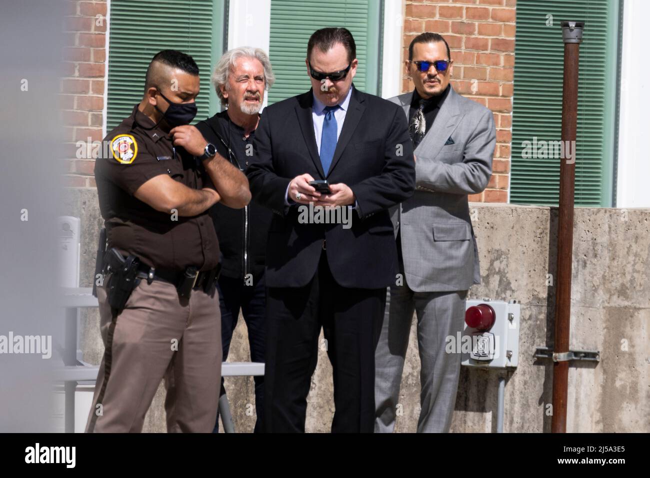 Johnny depp is seen with members of his legal team outside the fairfax