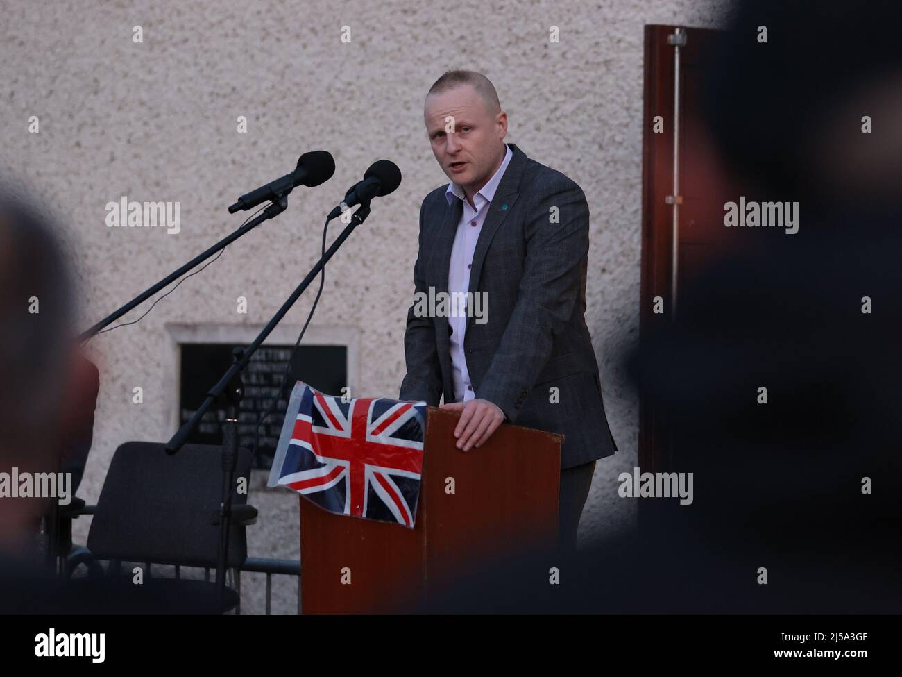 Loyalist blogger Jamie Bryson speaking at a a rally in opposition to the Northern Ireland Protocol, organised by West Tyrone United Unionists, in Castlederg, Co Tyrone. Picture date: Thursday April 21, 2022. Stock Photo