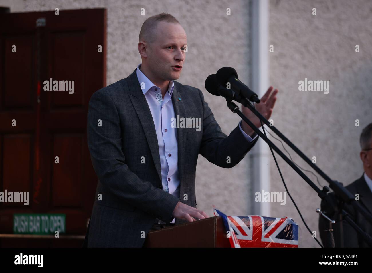 Loyalist blogger Jamie Bryson speaking at a a rally in opposition to the Northern Ireland Protocol, organised by West Tyrone United Unionists, in Castlederg, Co Tyrone. Picture date: Thursday April 21, 2022. Stock Photo