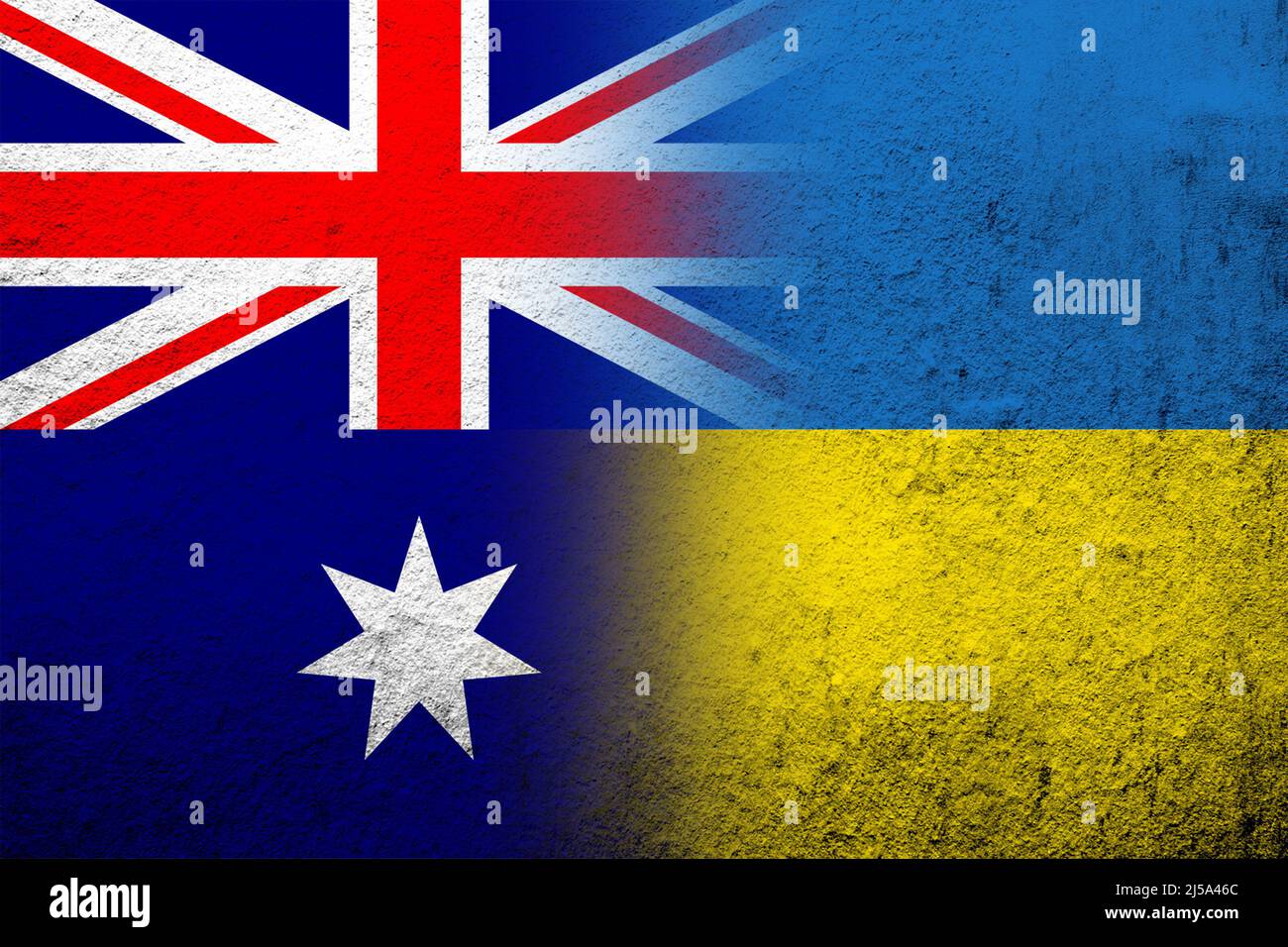 National flag of Australia with National flag of Ukraine. Grunge background Stock Photo