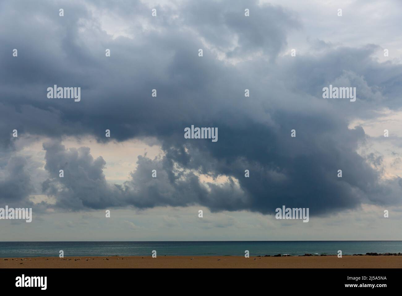 Dramatic dark cloudy sky over sea, natural photo background Stock Photo ...