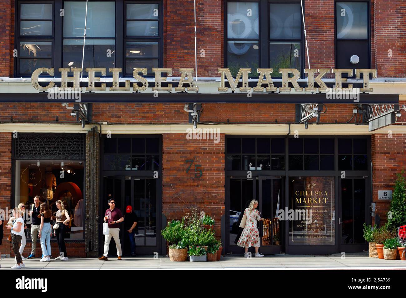 Chelsea Market, 75 Ninth Ave, New York, NY. exterior storefront of a gourmet food hall and Google office space in a former Nabisco factory. Stock Photo