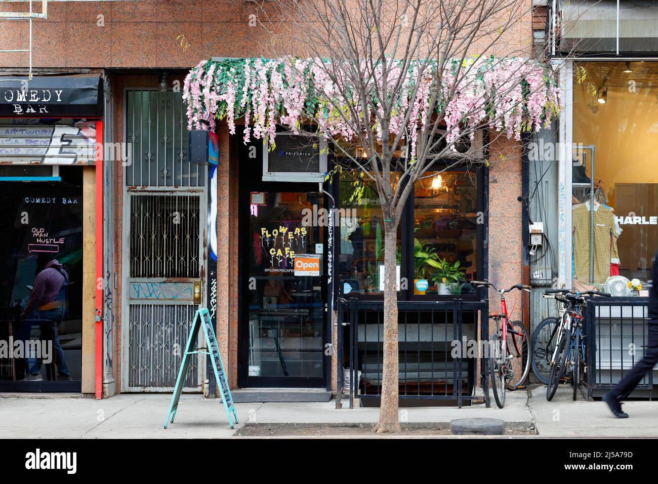 Flowers Cafe, 39 Essex St, New York, NYC storefront photo of a breakfast and lunch cafe in the Lower East Side neighborhood in Manhattan. Stock Photo