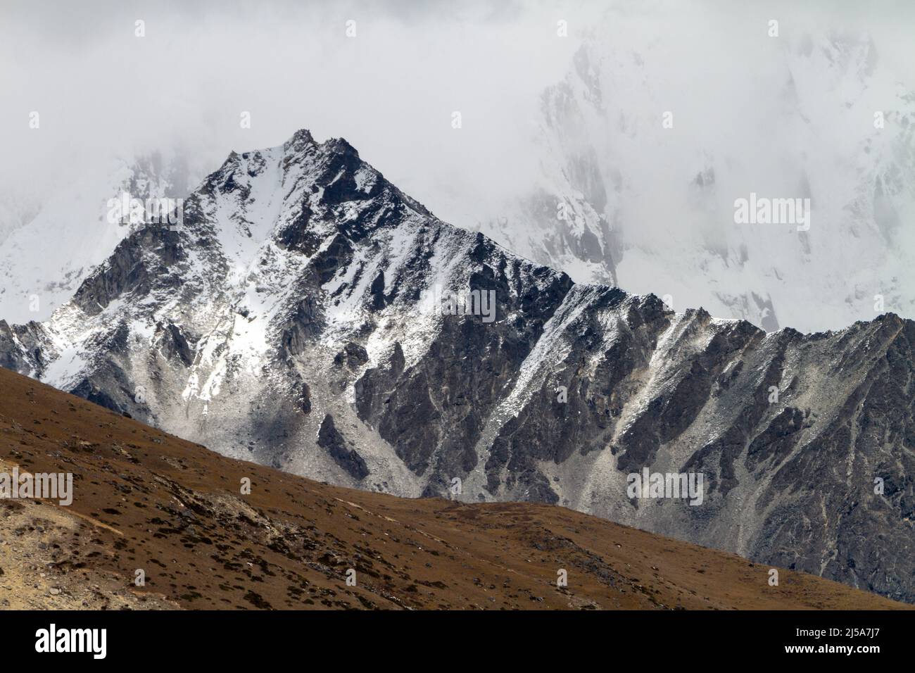 View of snowcapped mountains and cloud - Nepal Stock Photo