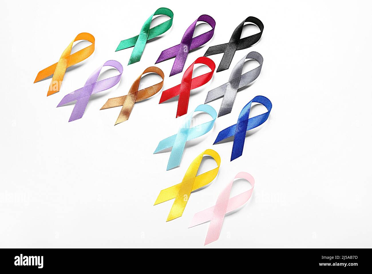 Colorfull Cancer Ribbon Many colorful awareness ribbons on white background. World Cancer Day ...