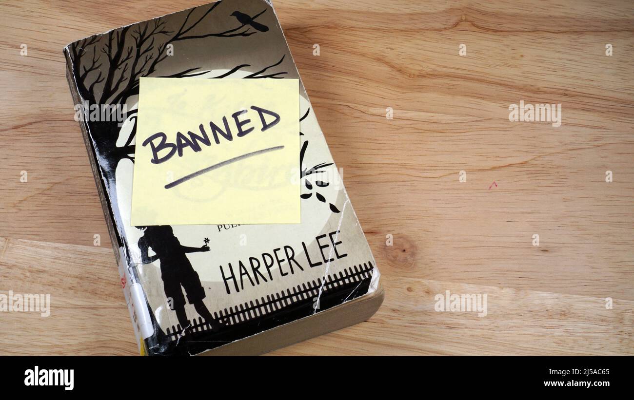 A copy of Harper Lee's To Kill A Mockingbird. The book is on many schools' banned books lists in the US. Stock Photo