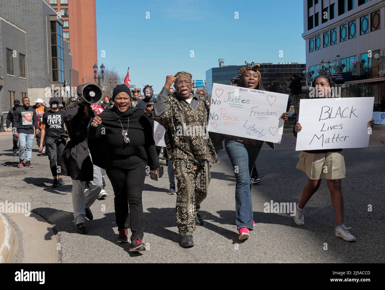 People march in a #Justice4Patrick rally for Patrick Lyoya, an unarmed Black man was shot and killed by a Grand Rapids Police officer during a traffic stop on April 4th, in Lansing, Michigan, U.S., April 21, 2022.  REUTERS/Rebecca Cook Stock Photo