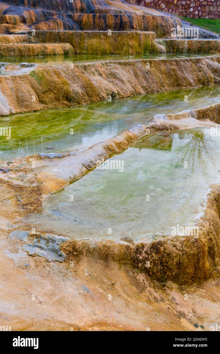 Natural terraced baths thermal Karahyit Red Springs, Turkey Stock Photo