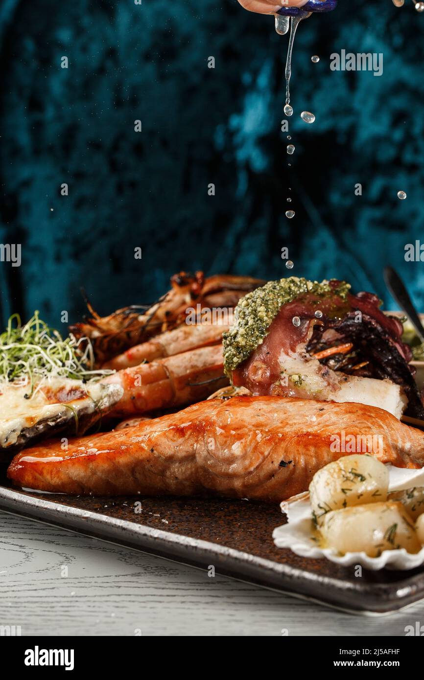 Roasted Mixed Seafood Contain Mussels, prawns, salmon, Calamari Squids ...