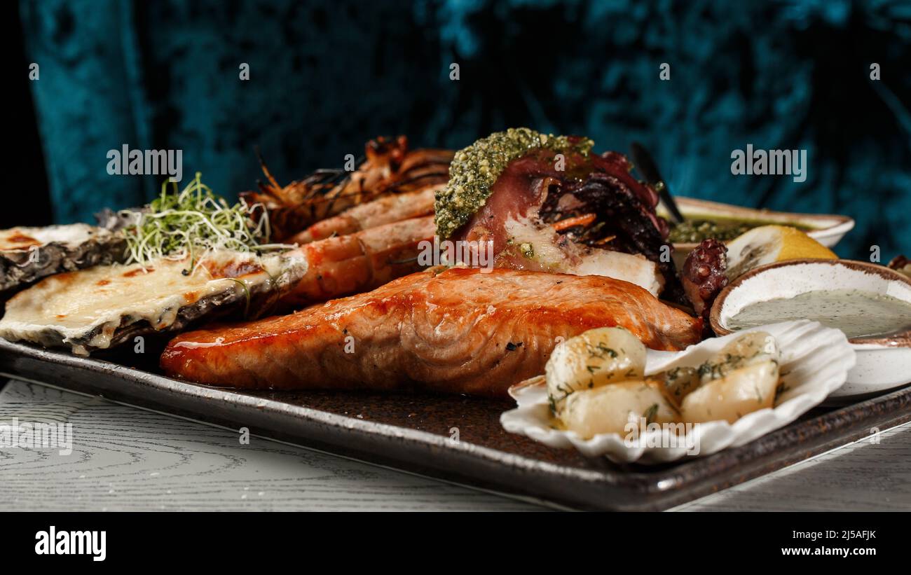Roasted Mixed Seafood Contain Mussels, prawns, salmon, Calamari Squids ...