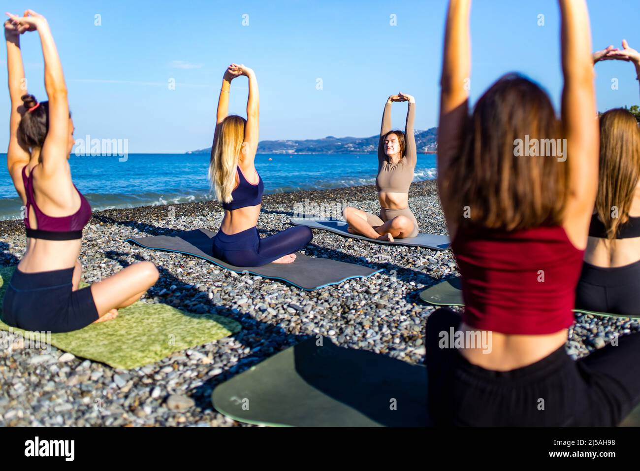 Five women pose hi-res stock photography and images - Alamy