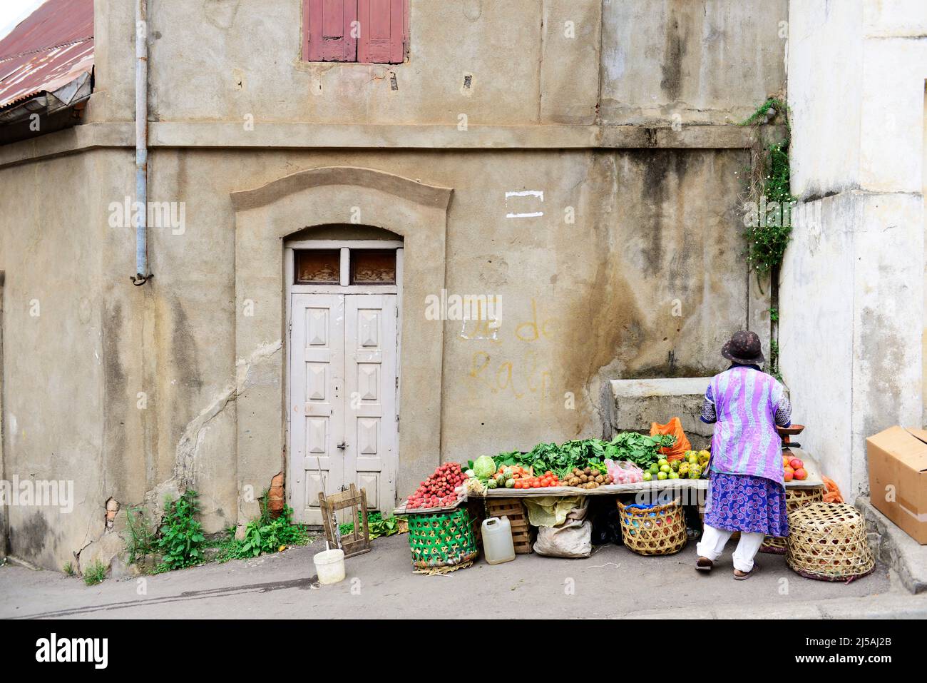 A vegetable vendor in Antananarivo, Madagascar. Stock Photo