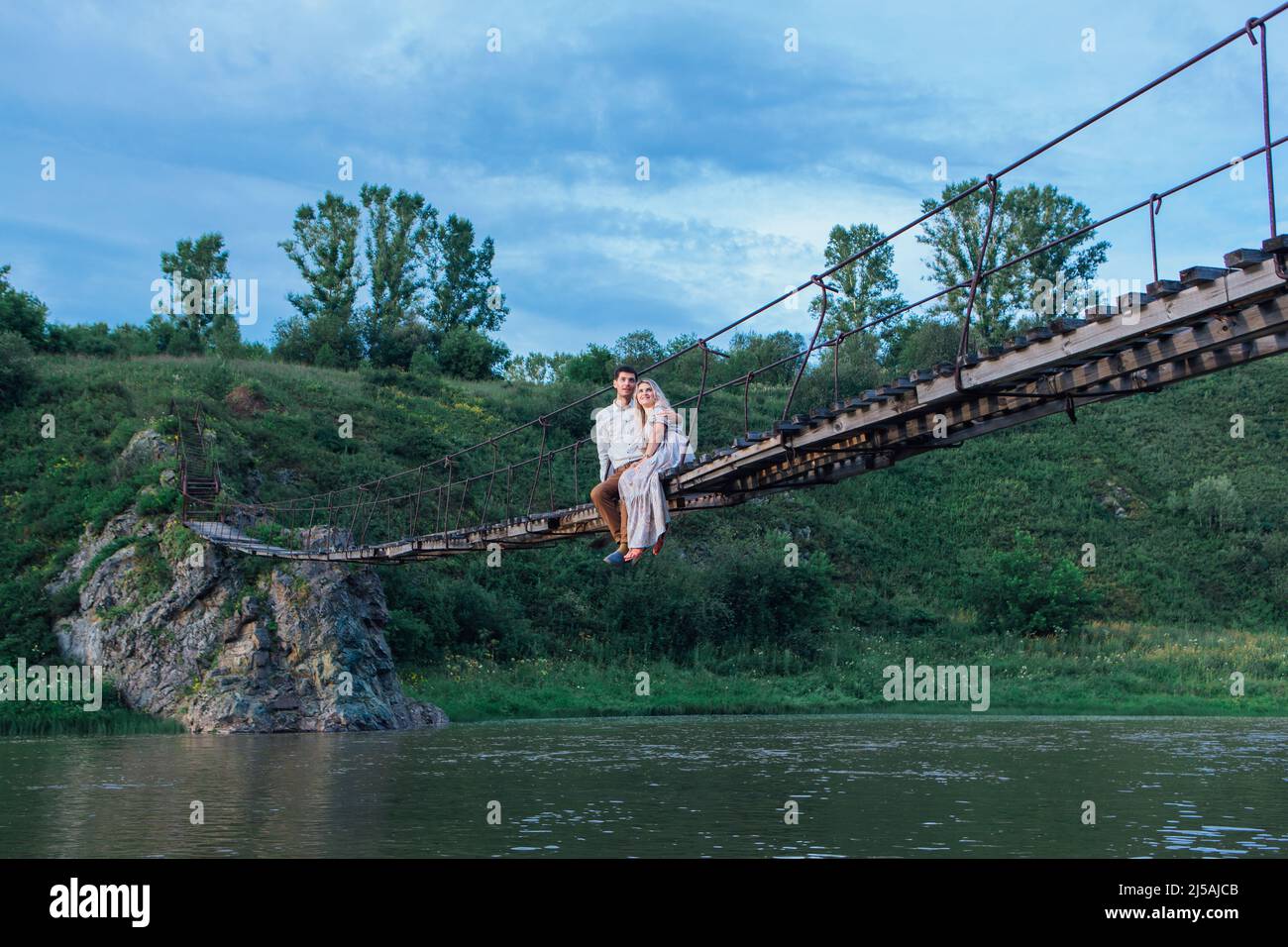Candid wedding on bridge hi-res stock photography and images - Alamy