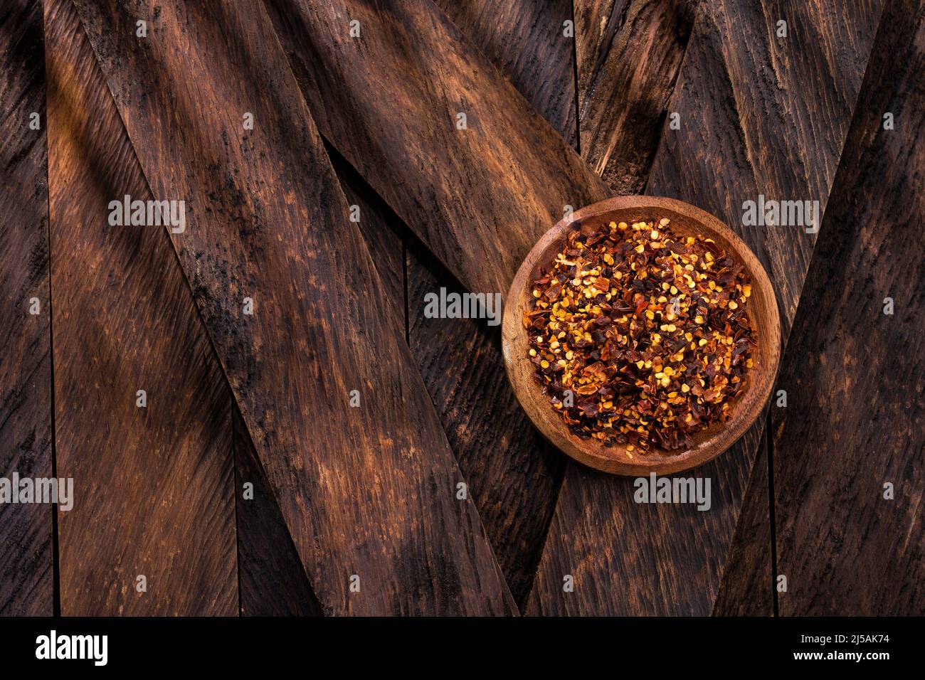 Crushed red pepper in a bowl dried chili Stock Photo Alamy