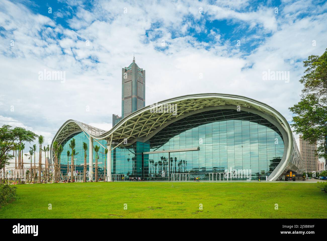 September 3, 2016: Kaohsiung Exhibition Center and Tuntex Sky Tower in Cianjhen district of kaohsiung city, taiwan. The exhibition center is designed Stock Photo