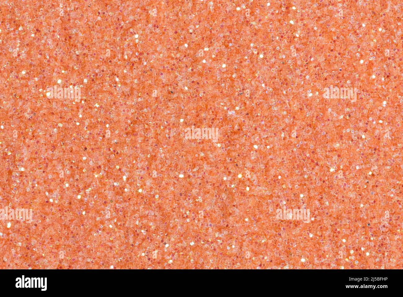 Peach background with glitter and light closeup Stock Photo Alamy
