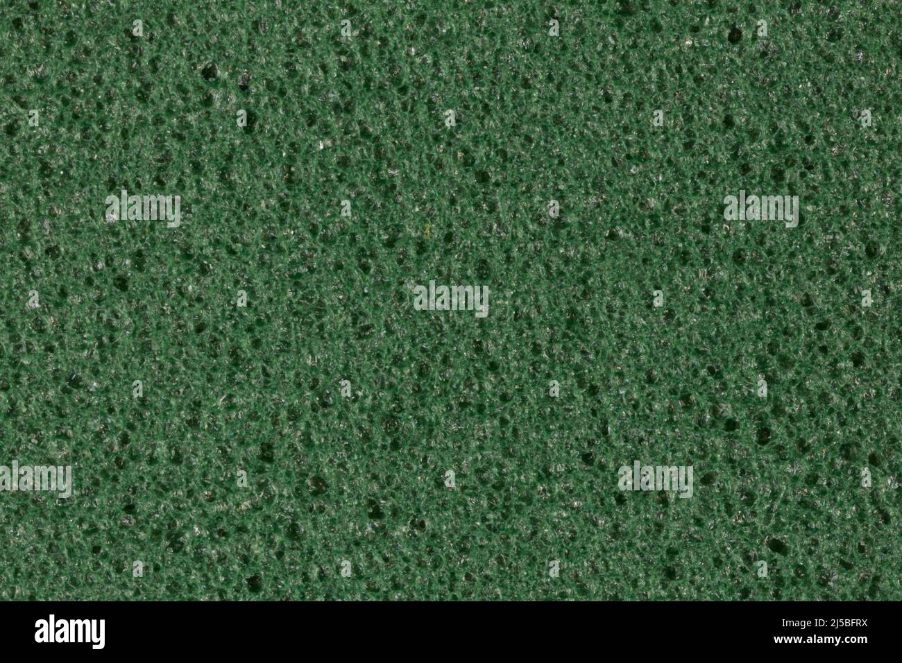 Darkened green foam EVA texture with porosity on surface Stock Photo