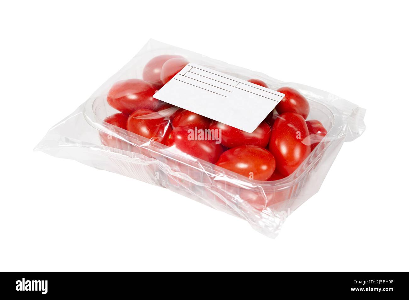 Packed and labeled cherry tomatoes on an isolated white background Stock Photo