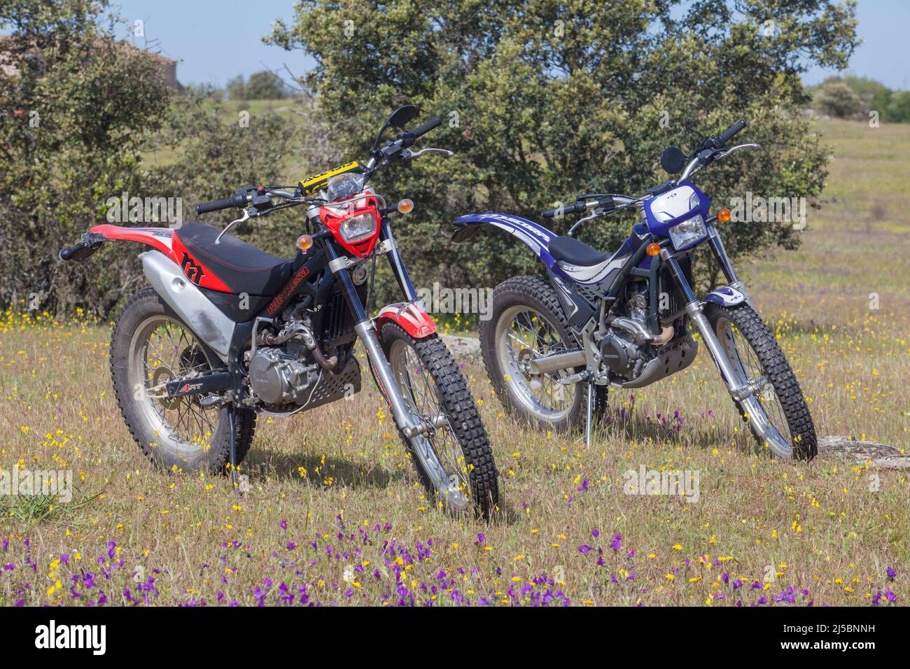 Merida, Spain - April 10th, 2022: Motorcycle trial bikes standing on country Stock Photo