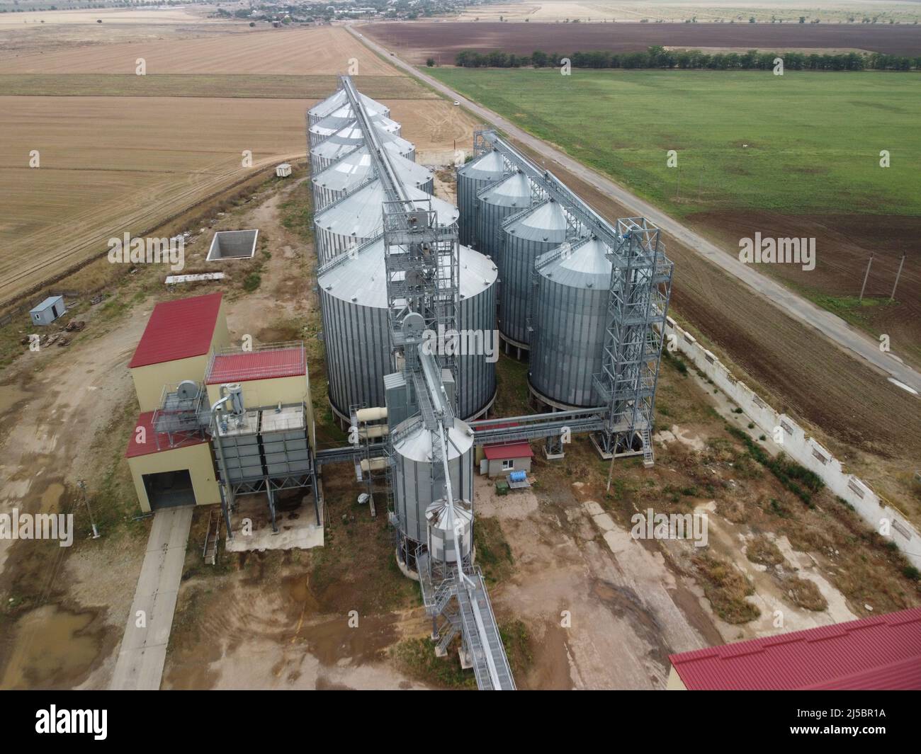 Grain elevator. Metal grain elevator in agricultural zone. Agriculture