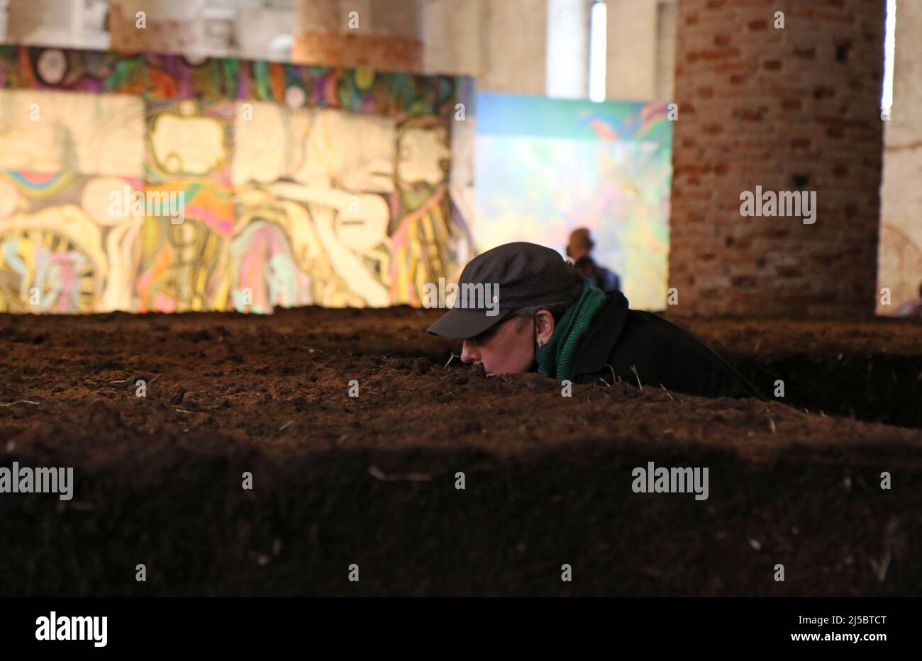 Italy, Venice, April 19, 2022 : Visitors view 'Inner Earth' by Colombian artist Delcy Morelos during a press day at the 59th Venice Art Biennale in Ve Stock Photo