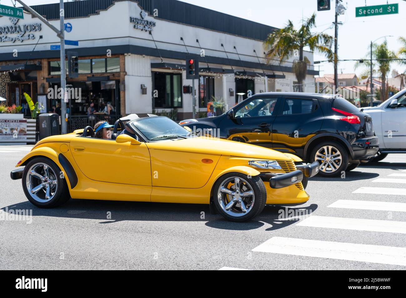 Long Beach, California USA - March 31, 2021: luxury car of yellow Chrysler Plymouth Prowler Stock Photo