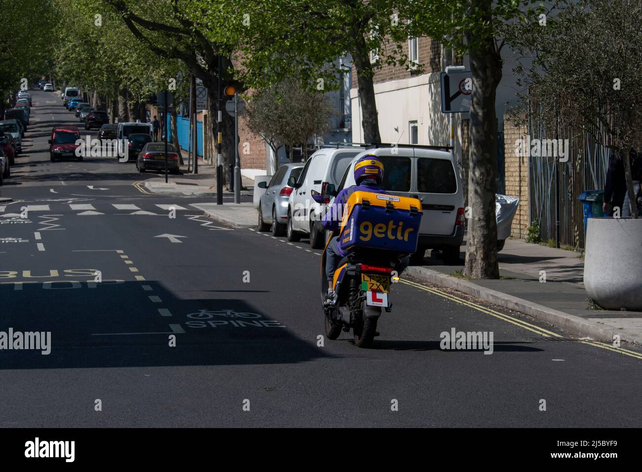 A Getir courier on a moped Stock Photo